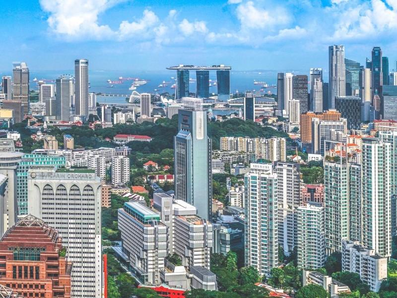 how to invest in singapore real estate